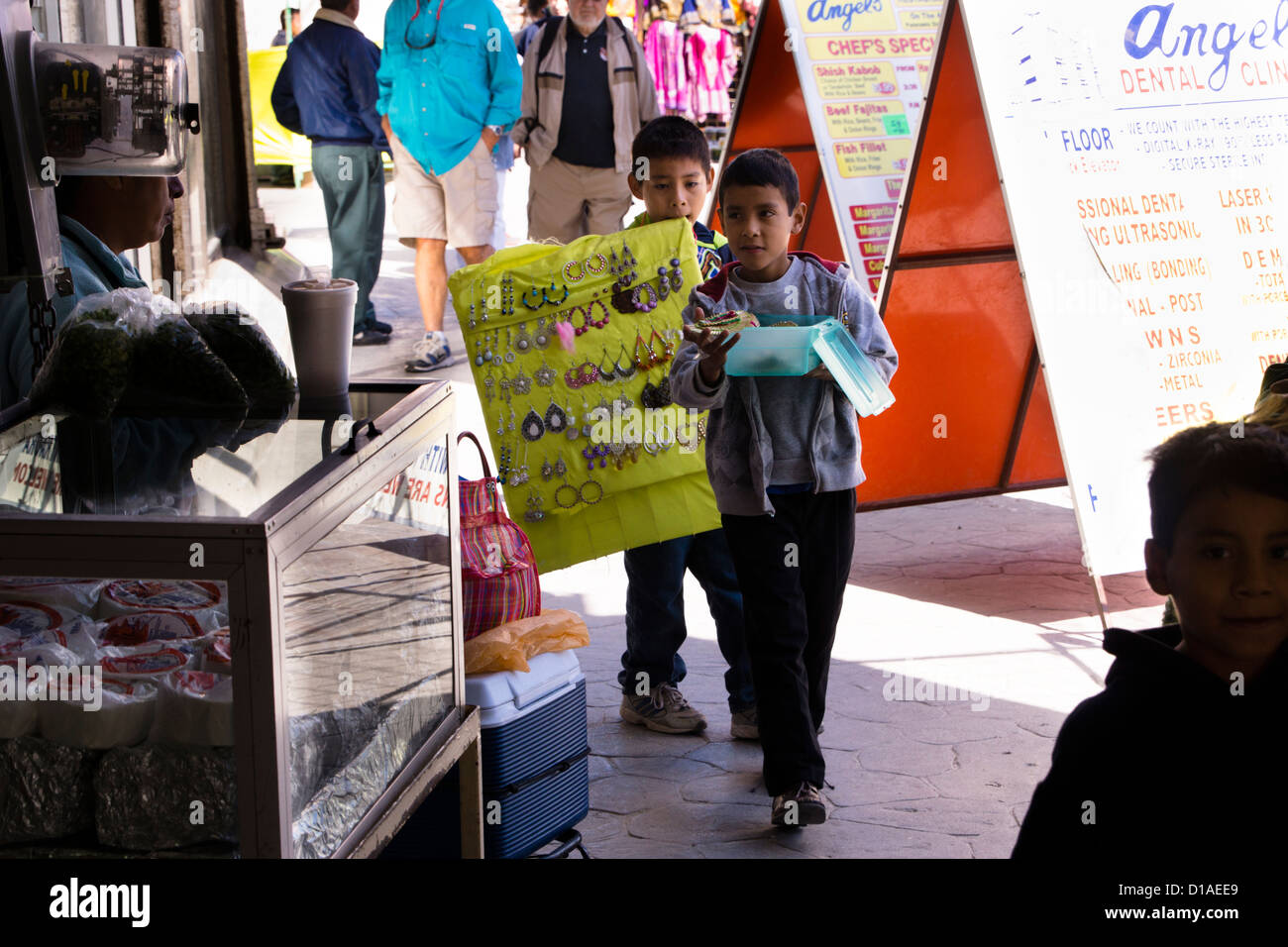 Children selling trinkets and souvenirs in Nuevo Progreso, Tamaulipas, Mexico. Stock Photo