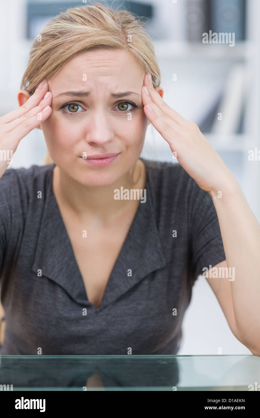 Frustrated rubbing temples hi-res stock photography and images - Alamy