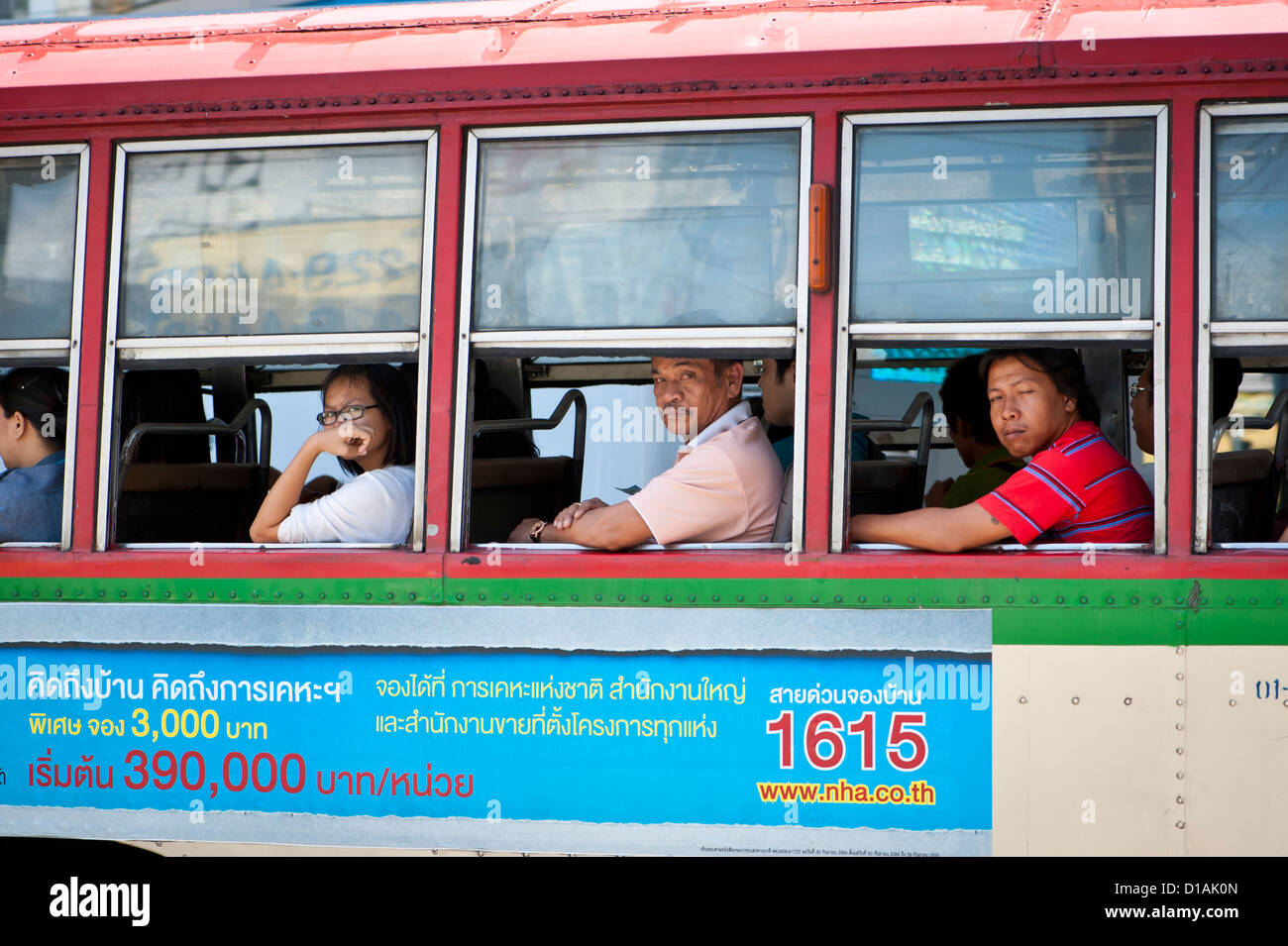 Passengers on a bus, Bangkok Stock Photo