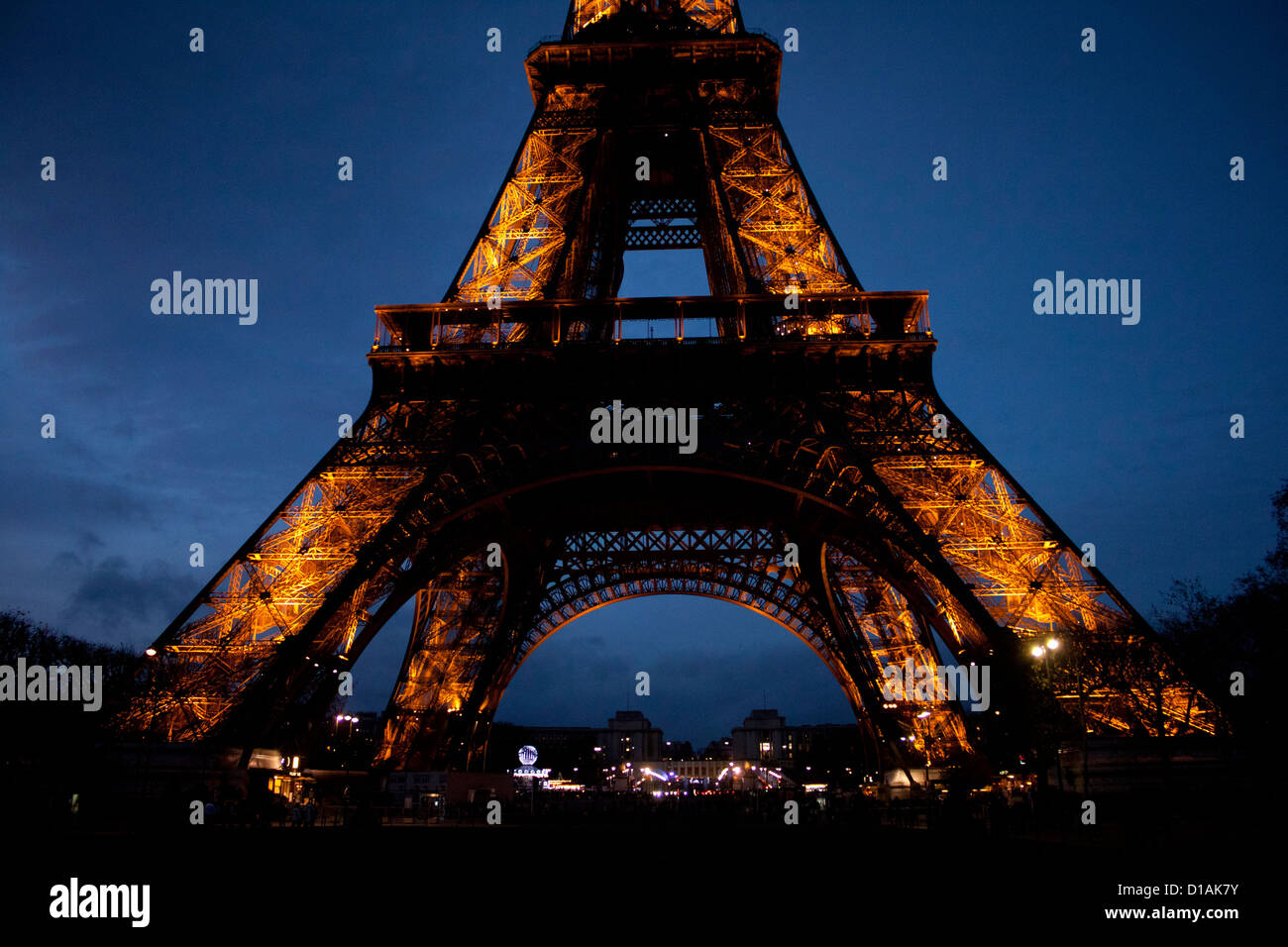Yellow Eiffel Tower at night after blue sunset, France Paris Stock Photo