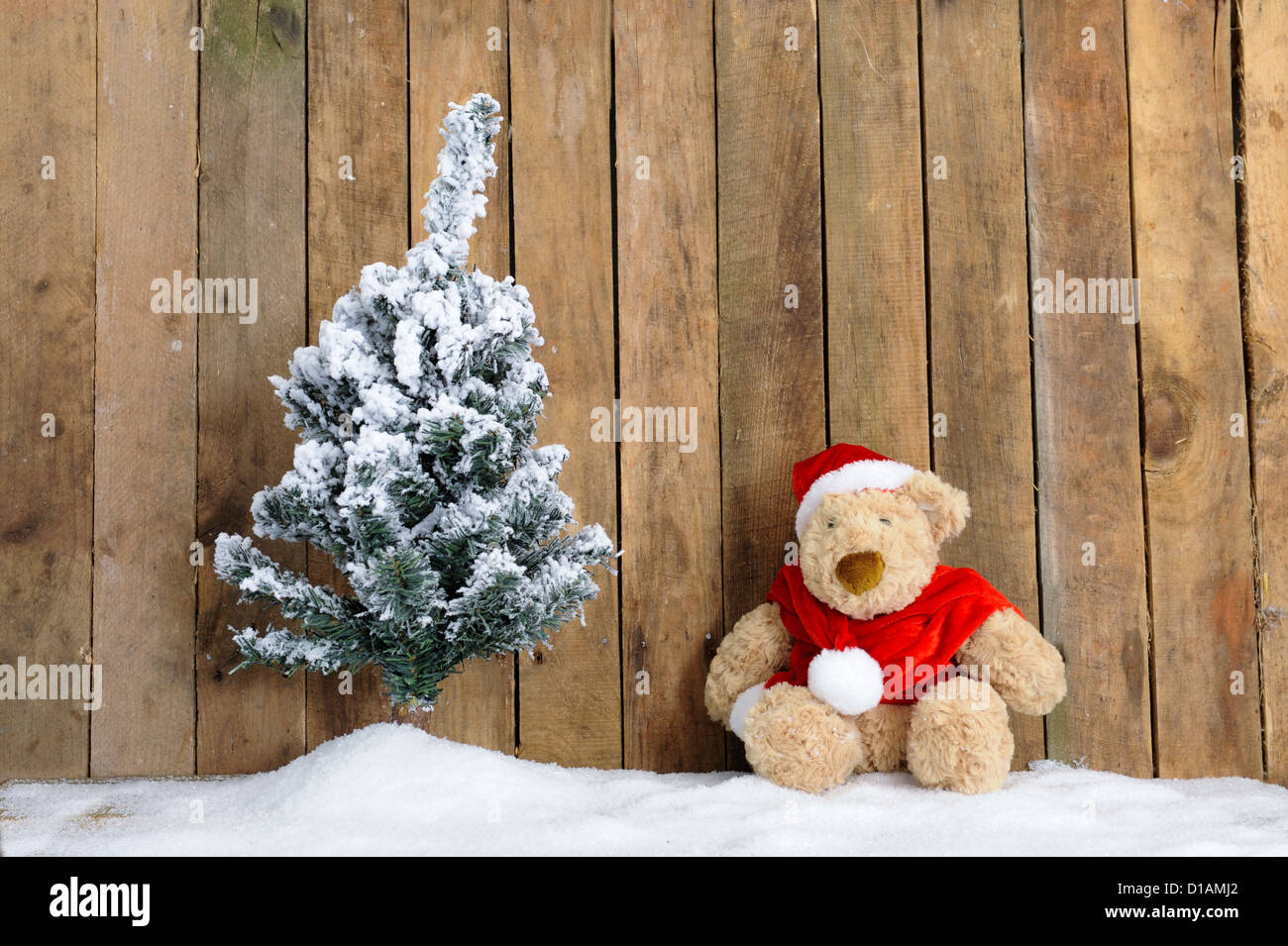 Cute teddy bear in snow hi-res stock photography and images - Alamy