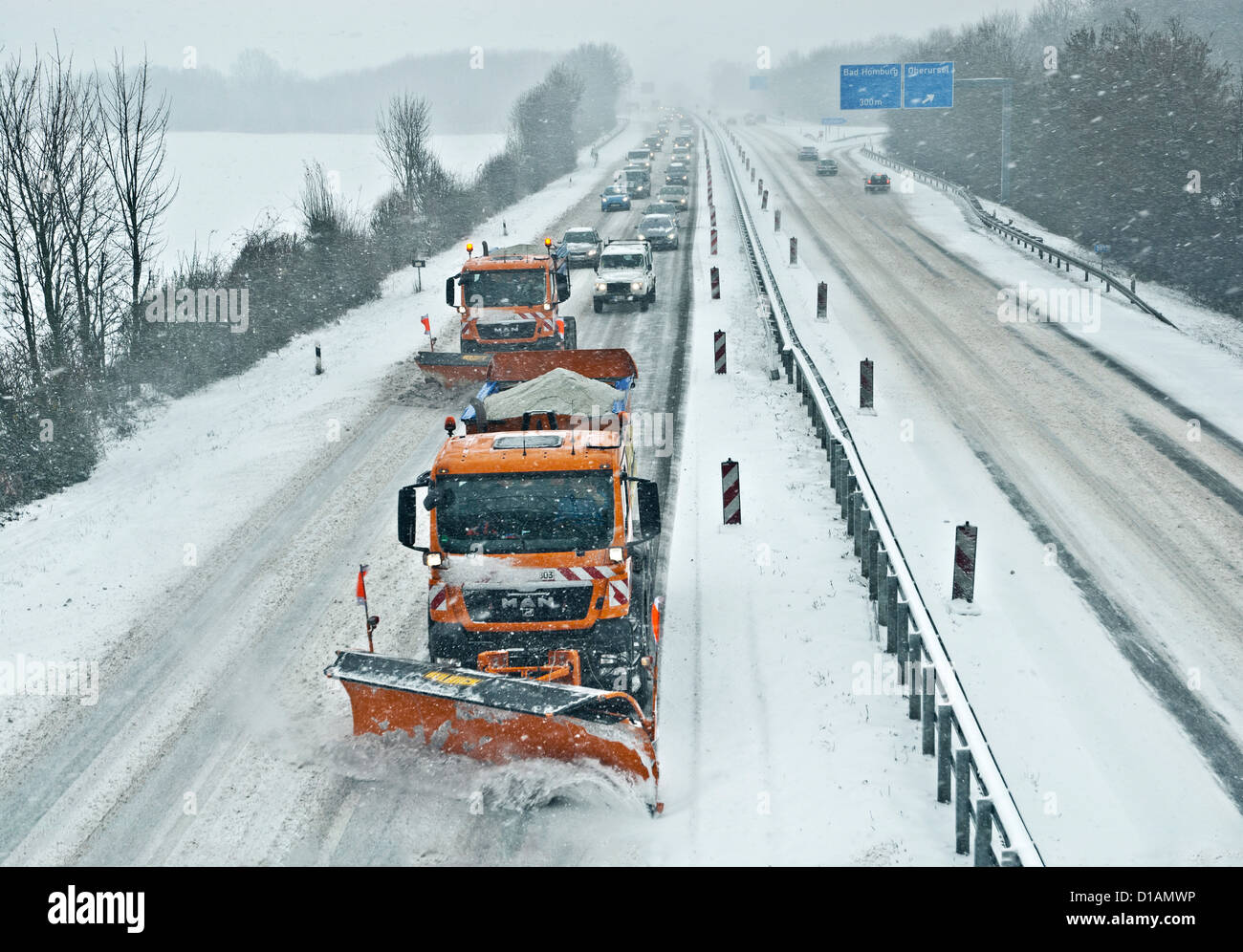 Snow removers on the highway A 661 at Bad Homburg in the Taunus. Stock Photo