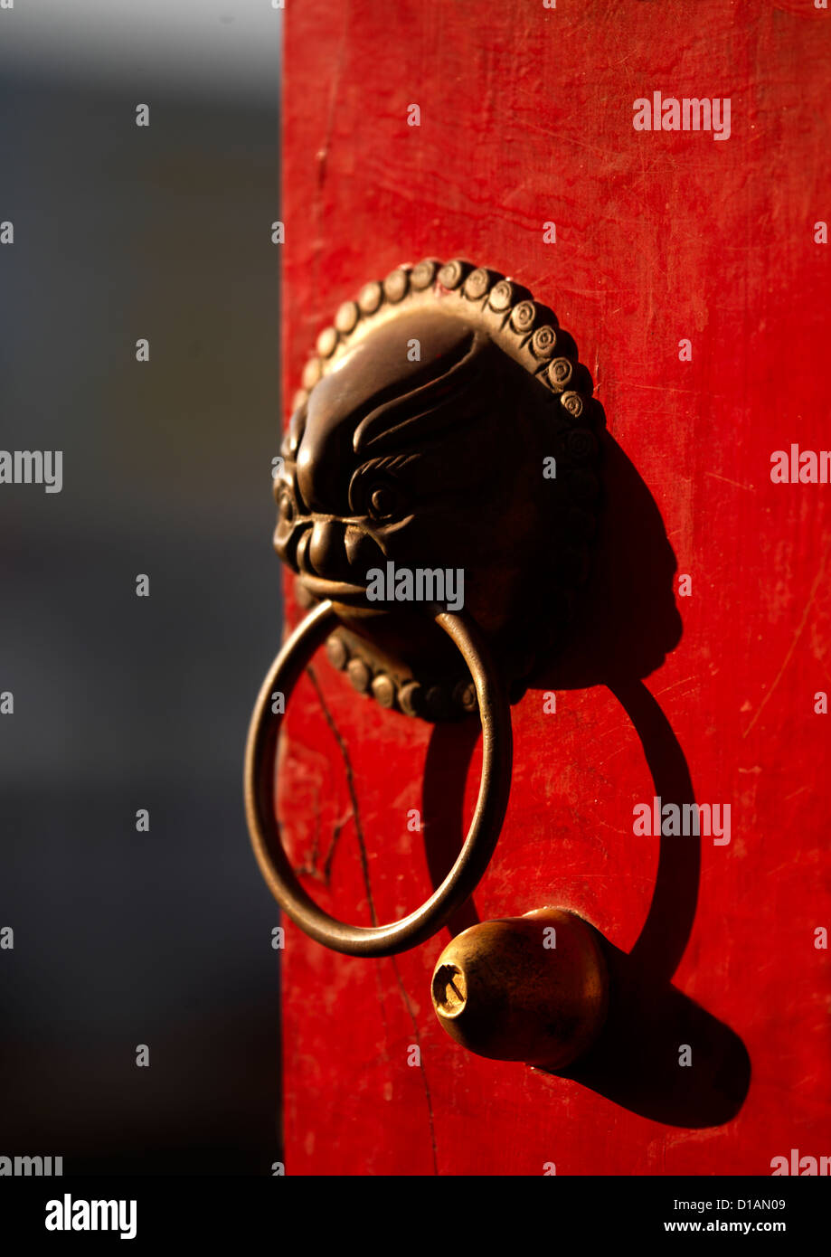 Painted Door With Lion Door Knocker In Chaoyang Tower City Gate, Ancient Town, Jianshui, Yunnan Province, China Stock Photo