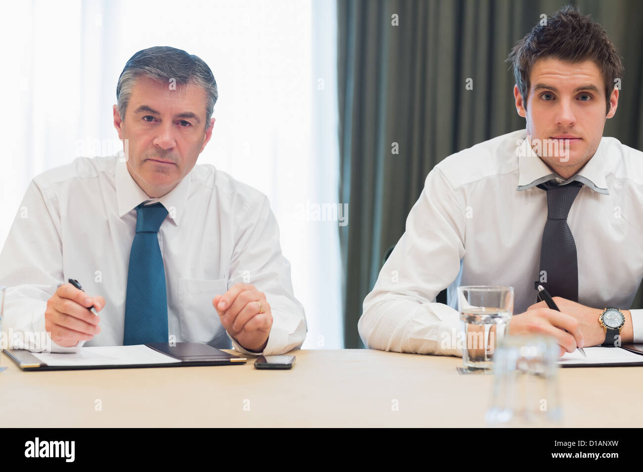 Businessmen looking up Stock Photo - Alamy