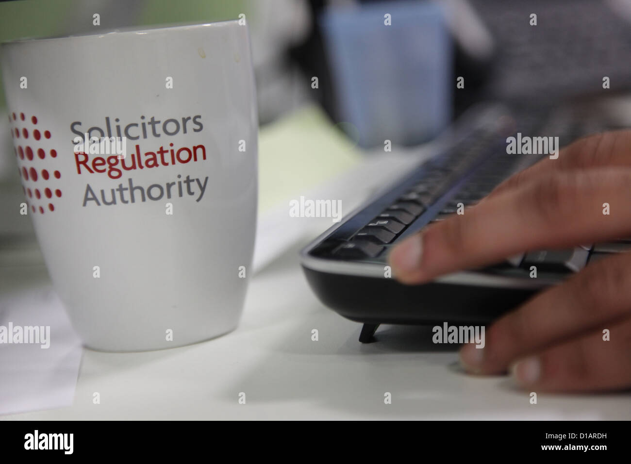 The offices of the Solicitors Regulation Authority in Birmingham. A mug depicts the name of the organization. Stock Photo