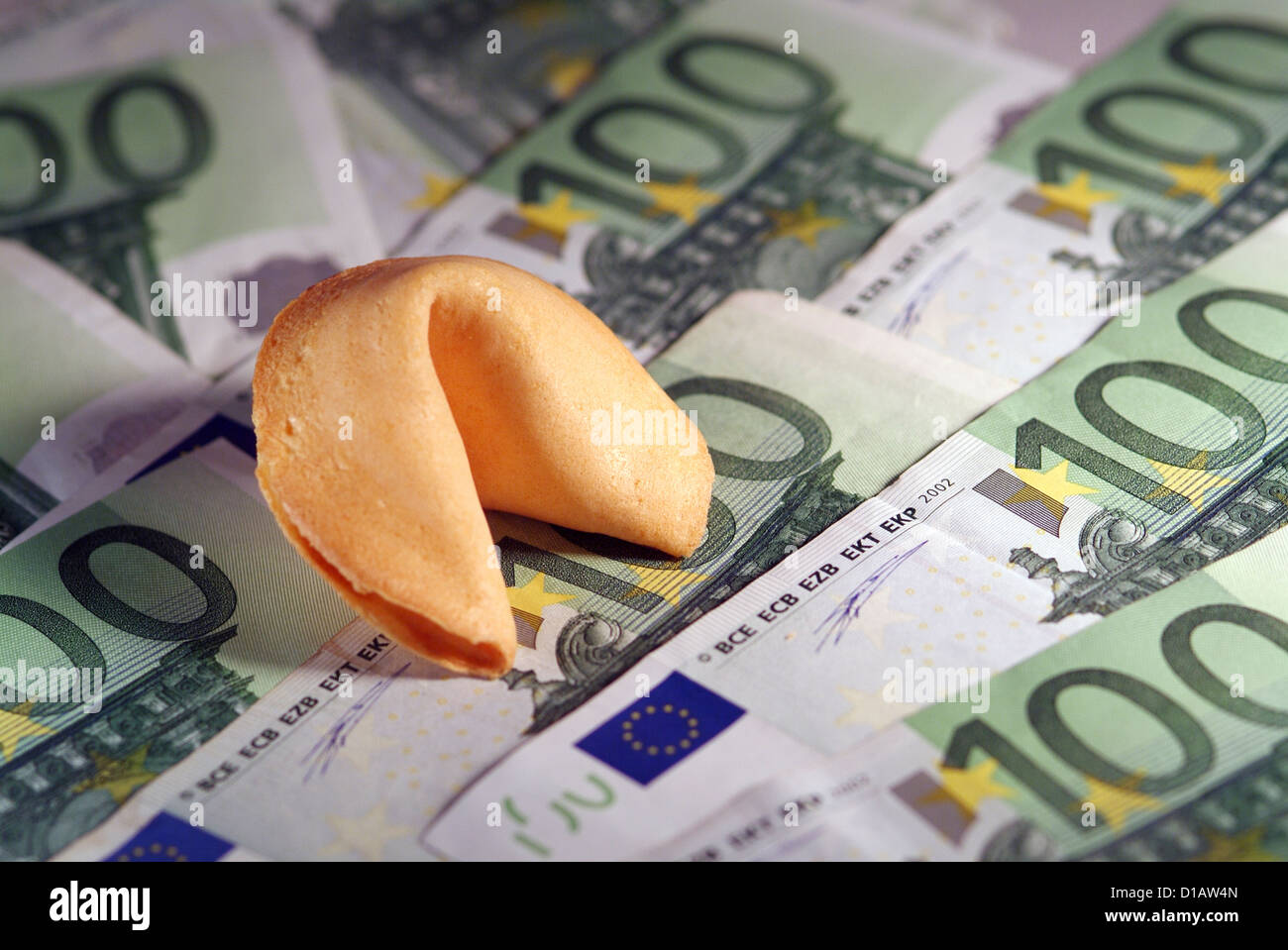 Traditional Fortune Cookies on a Background of Euros. Stock Photo