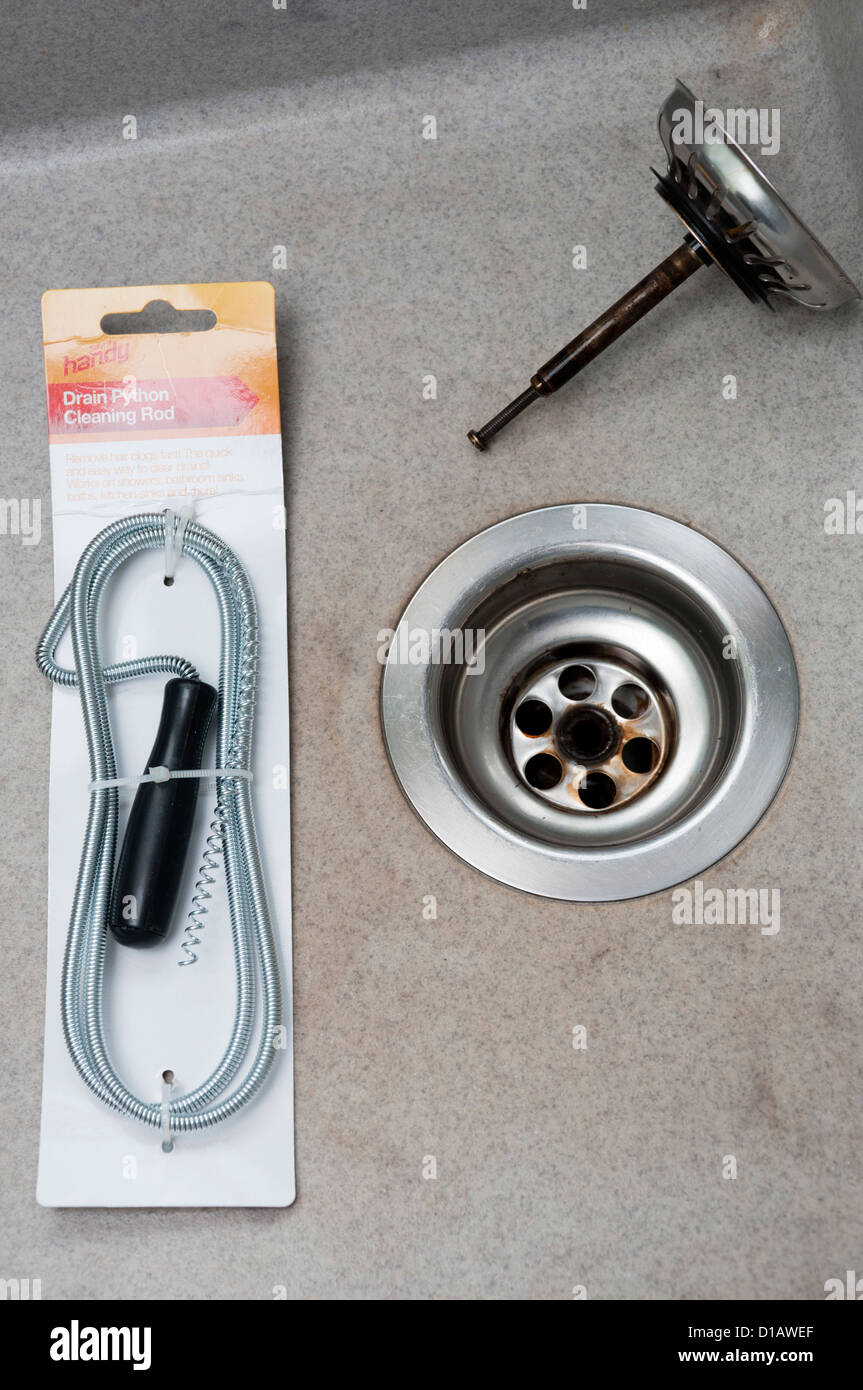 Drain python tool for cleaning and unblocking sink drains Stock Photo -  Alamy