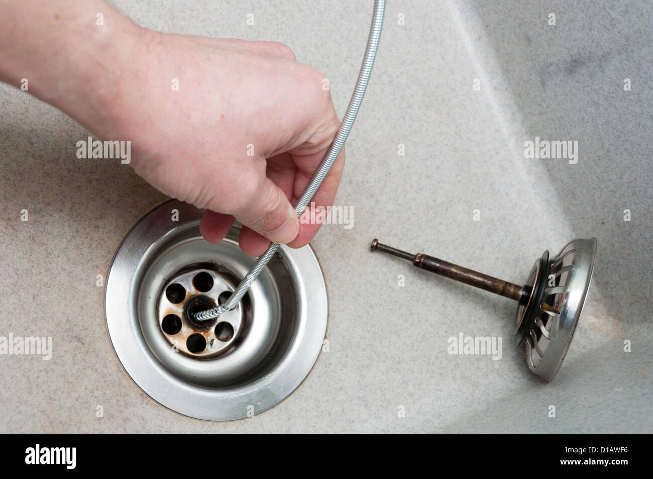 https://c8.alamy.com/comp/D1AWF6/drain-python-tool-for-cleaning-and-unblocking-sink-plughole-drains-D1AWF6.jpg