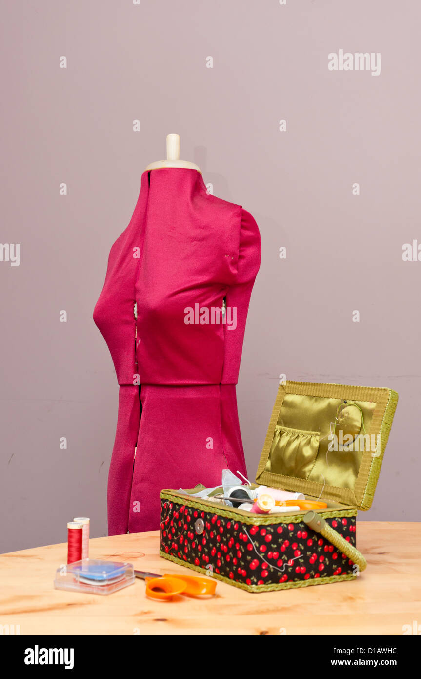 Tailors dummy and sewing box Stock Photo Alamy