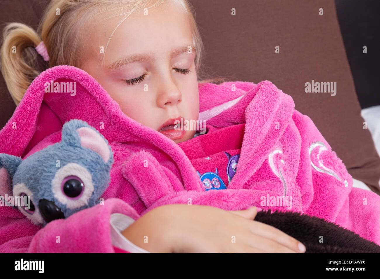 Cute little girl in pink jacket sleeping teddy bear Stock Photo Alamy