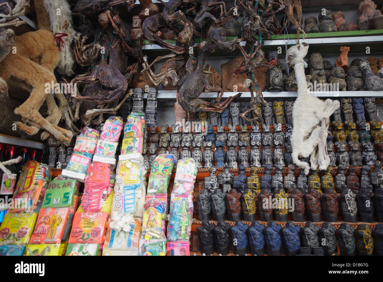 Colourful confectionery, dried llama foetuses and souvenirs in Witches' Market, La Paz, Bolivia Stock Photo