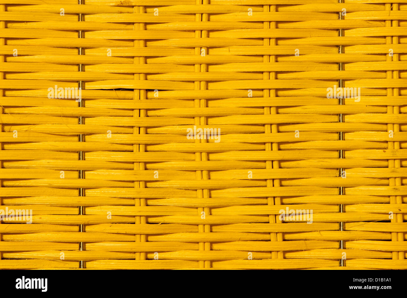 regular, orange rattan background - intensive color Stock Photo