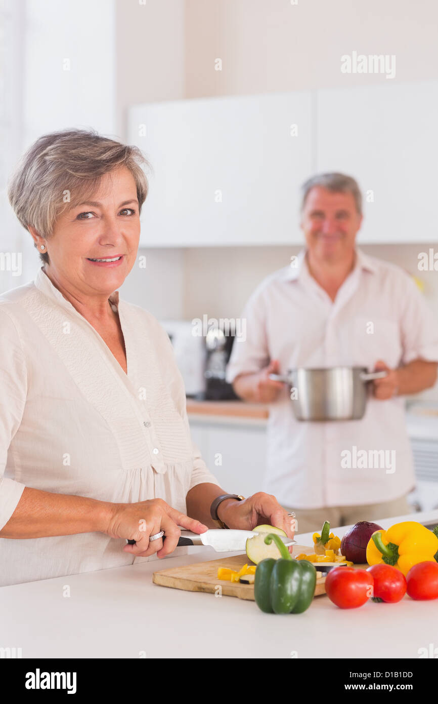 Old woman carrying food hi-res stock photography and images - Alamy