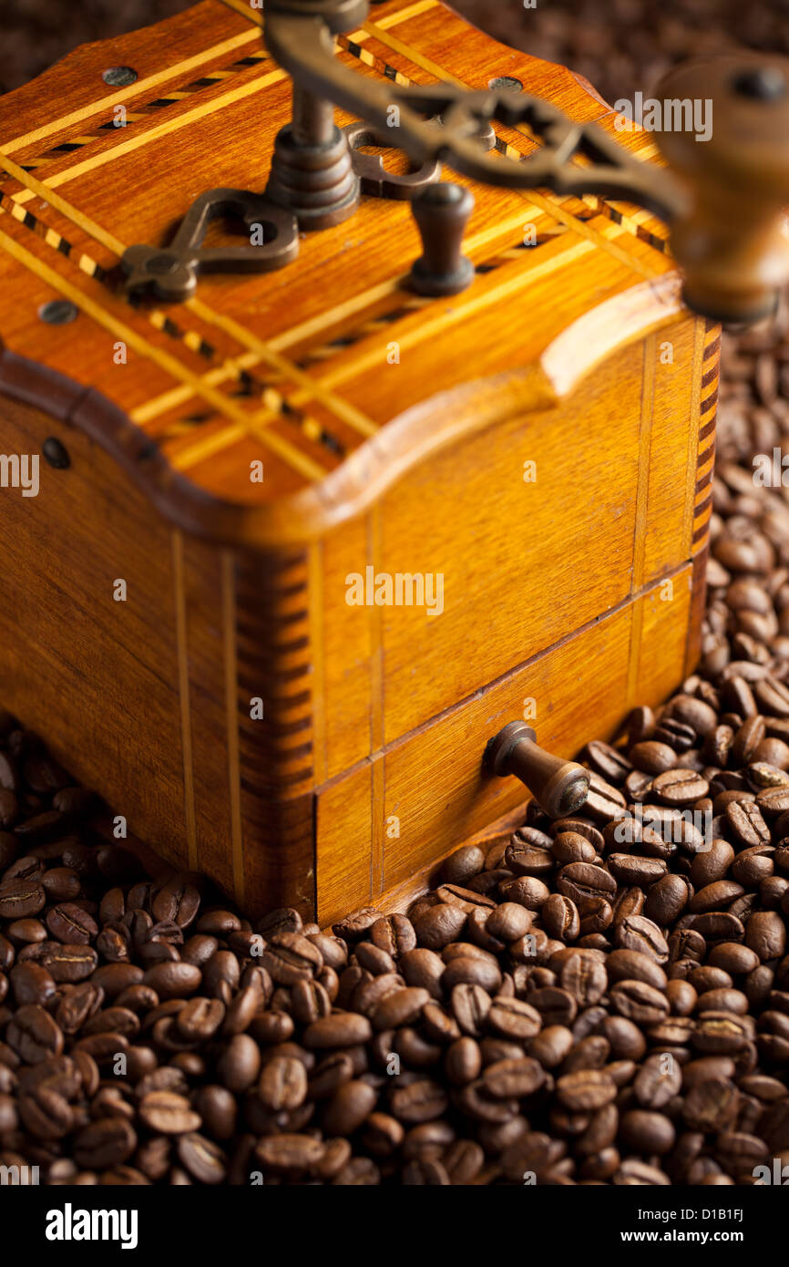 antique coffee mill with coffee beans Stock Photo Alamy