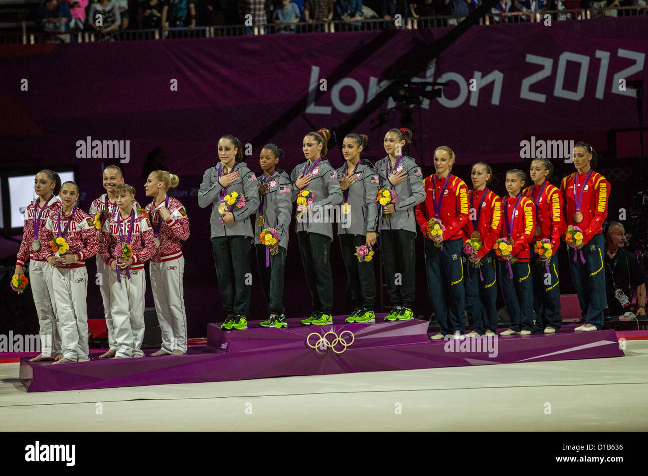 Women's Team Gymnastics medalist on the podium at the Olympic Summer Games, London 2012 Stock Photo