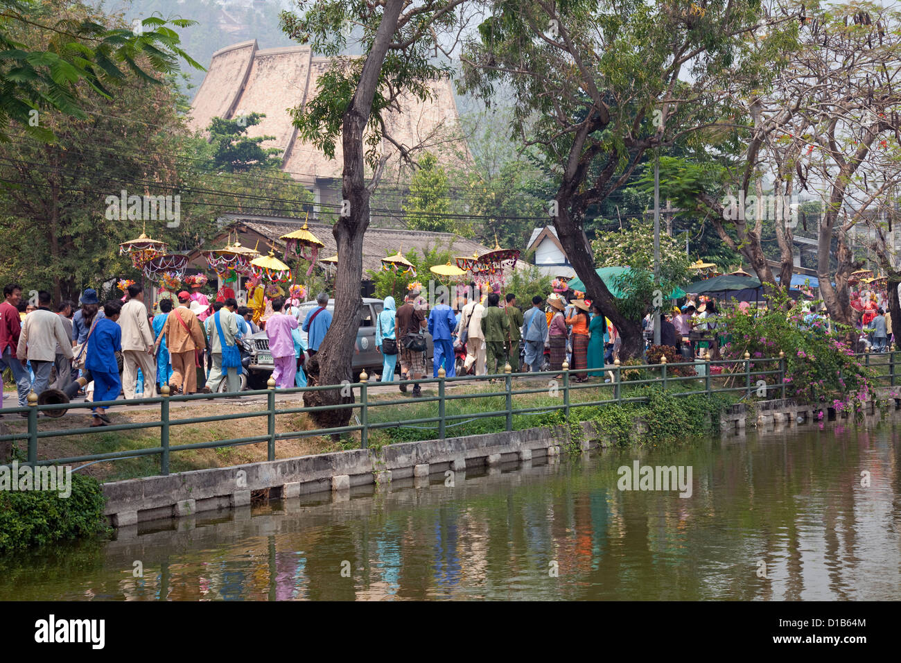 Procession of people at 'Poy Sang Long' festival where young monks are ordained, Mae Hong Son, Thailand Stock Photo
