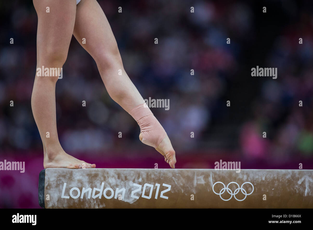 Detail of gymnast preforming on the balance beam during the women's