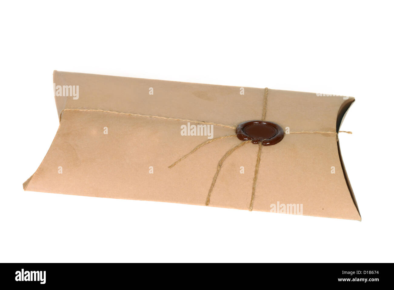 Parcel with rope and wax seal isolated on white background Stock Photo