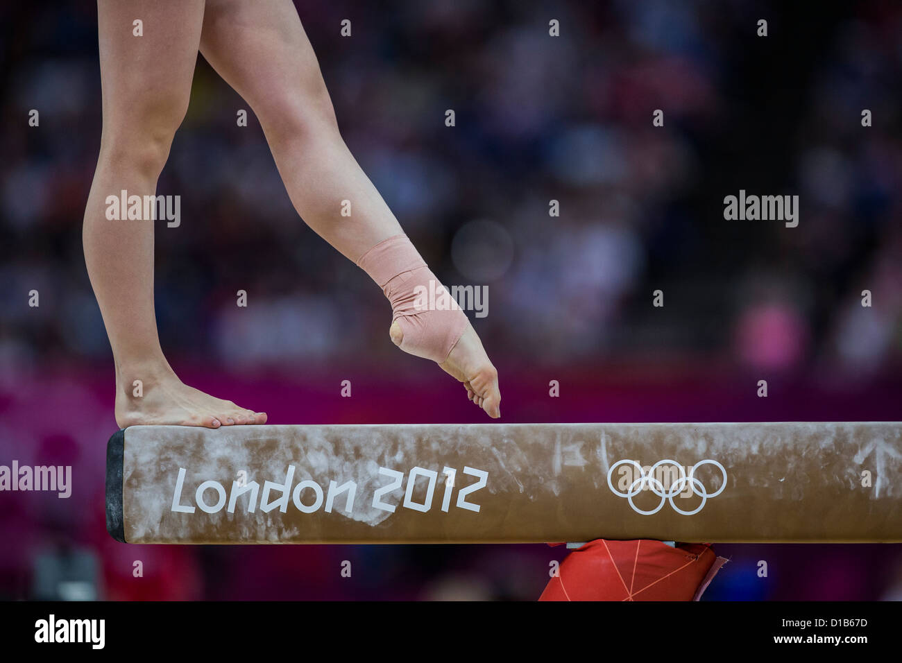 Detail of gymnast preforming on the balance beam during the women's