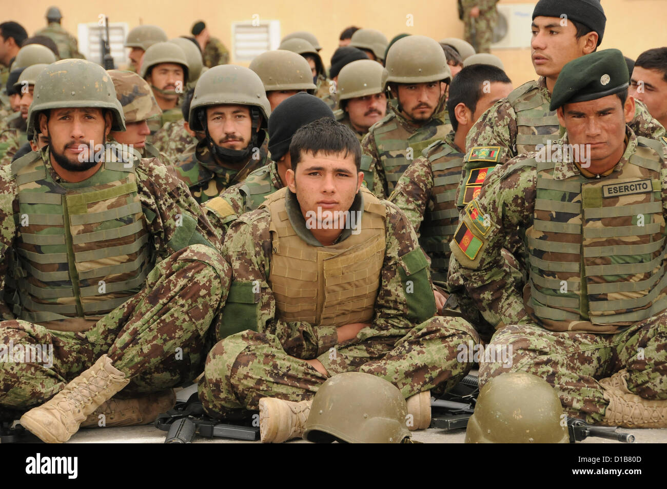 Farah Province, Afghanistan. 12th December 2012. Members of the Afghan National Army wait to participate in a Tranche 3 security transition ceremony at Camp Sayar December 12, 2012 in Farah province, Afghanistan. Stock Photo