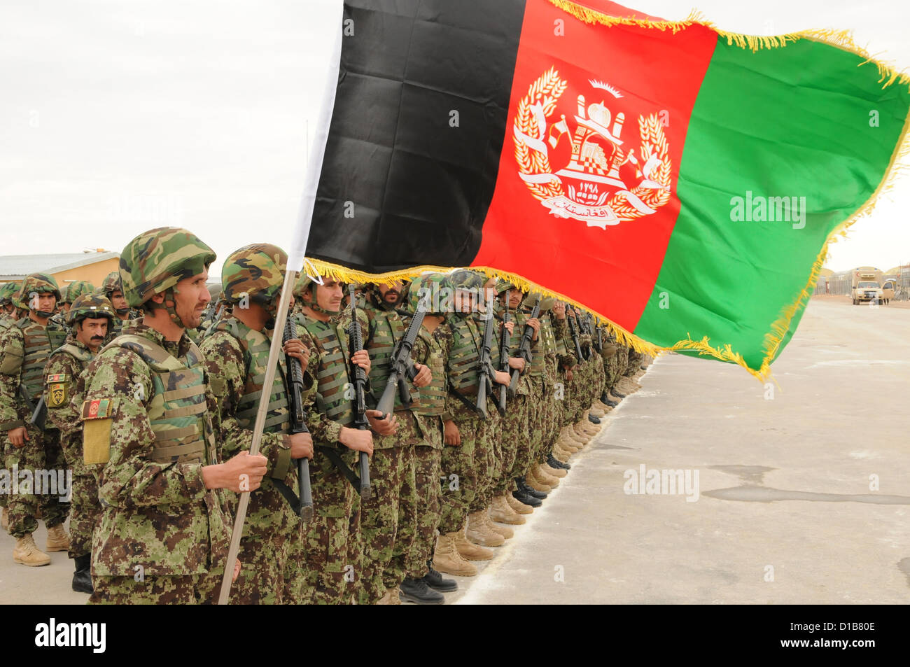 Farah Province, Afghanistan. 12th December 2012. Members of the Afghan National Army wait to participate in a Tranche 3 security transition ceremony at Camp Sayar December 12, 2012 in Farah province, Afghanistan. Stock Photo