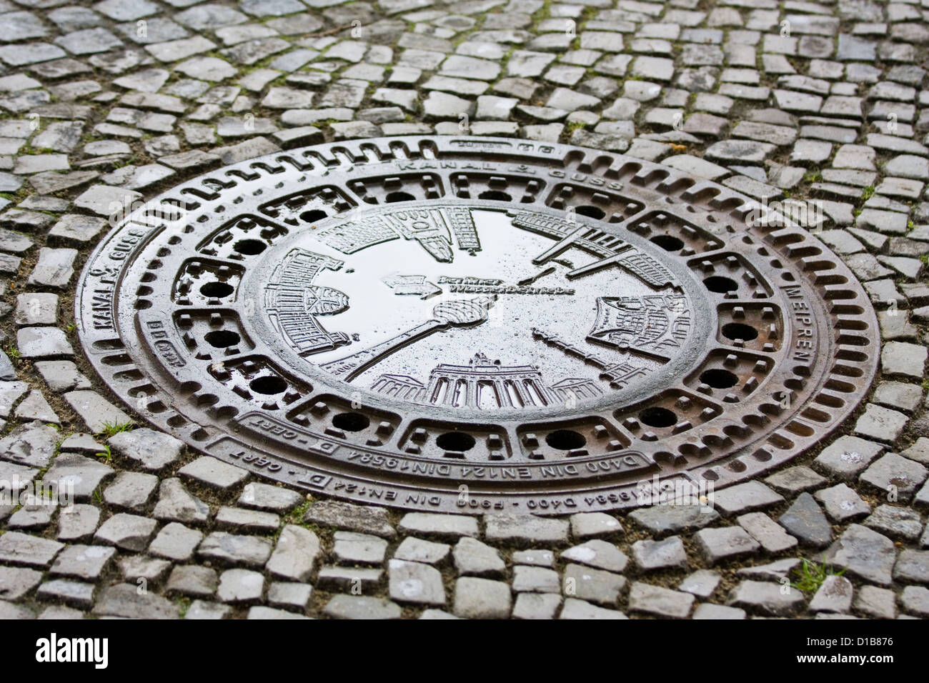 Berlin, Germany, decorative manhole cover on the street Stock Photo