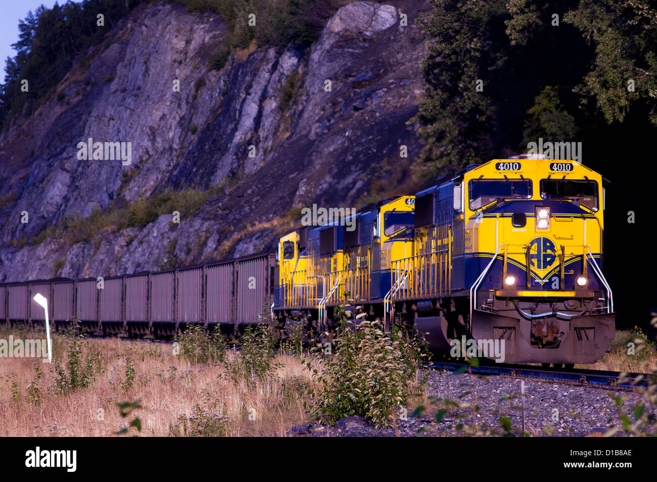The Alaska Railroad southbound coal train south from Anchorage to Seward Stock Photo