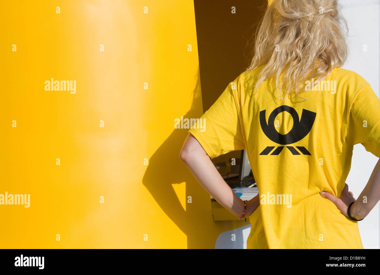 Berlin, Germany, postal logo on a t-shirt of a young woman Stock Photo -  Alamy