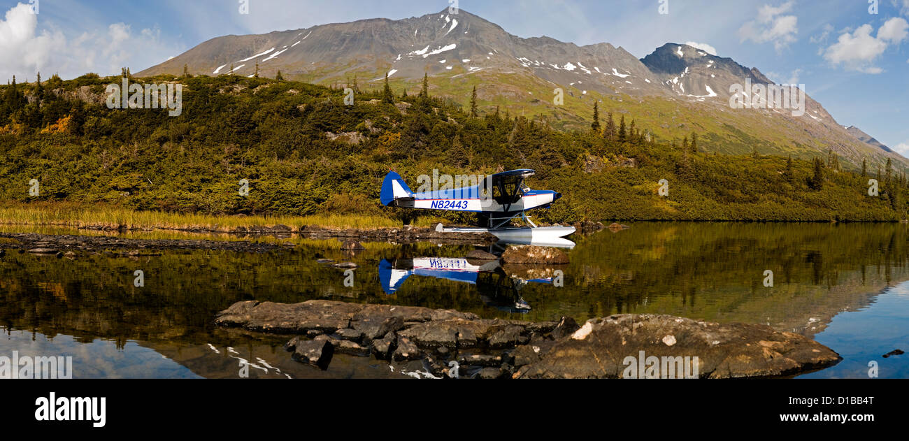 Piper Super Cub floatplane on Lower Paradise Lake in the Kenai Mountains in South Central Alaska Stock Photo