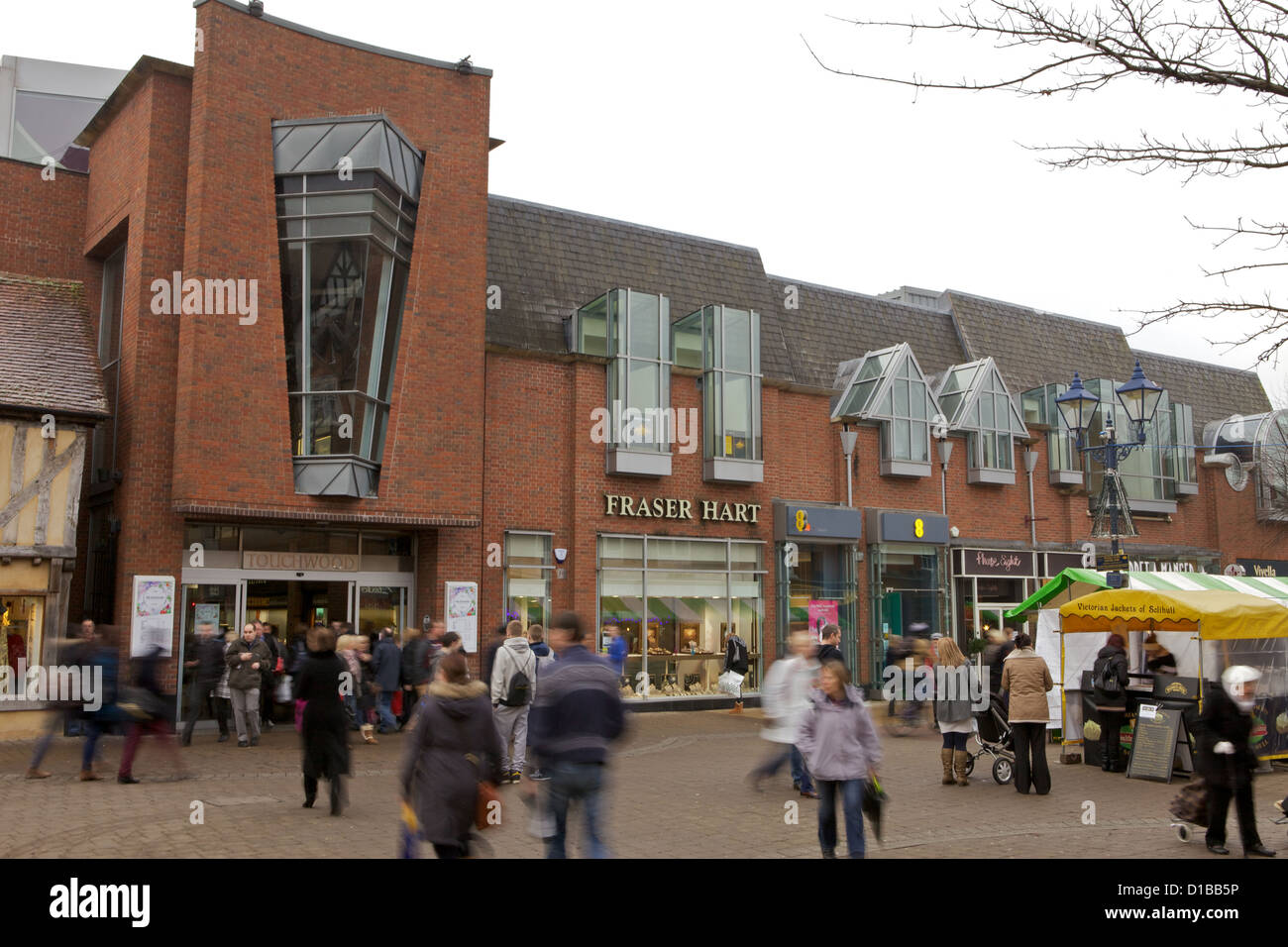 Christmas Shoppers on Solihull High Street outside Touchwood Shopping Centre. Stock Photo