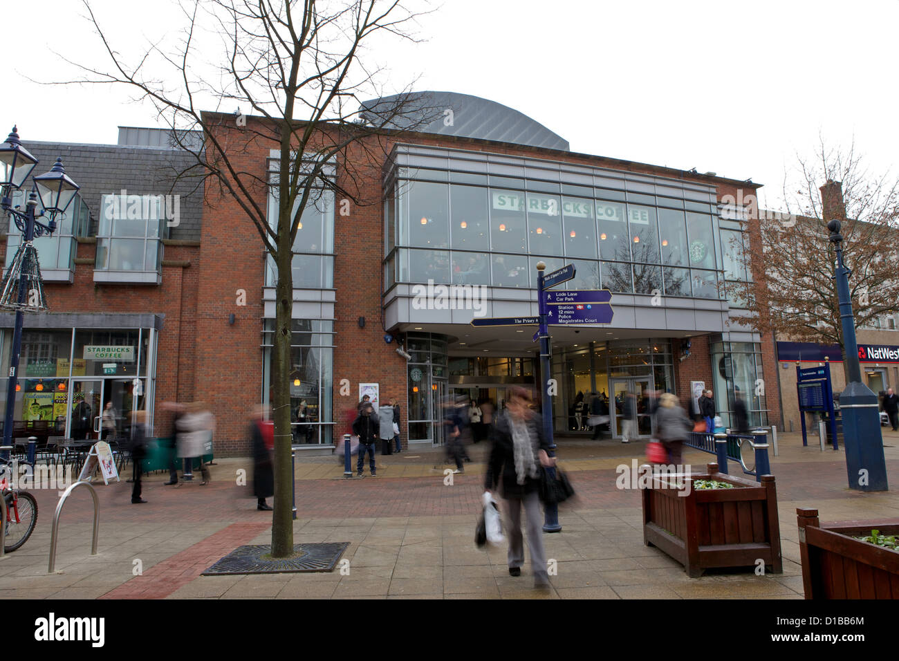 Christmas Shoppers on Solihull High Street outside Touchwood Shopping Centre. Stock Photo