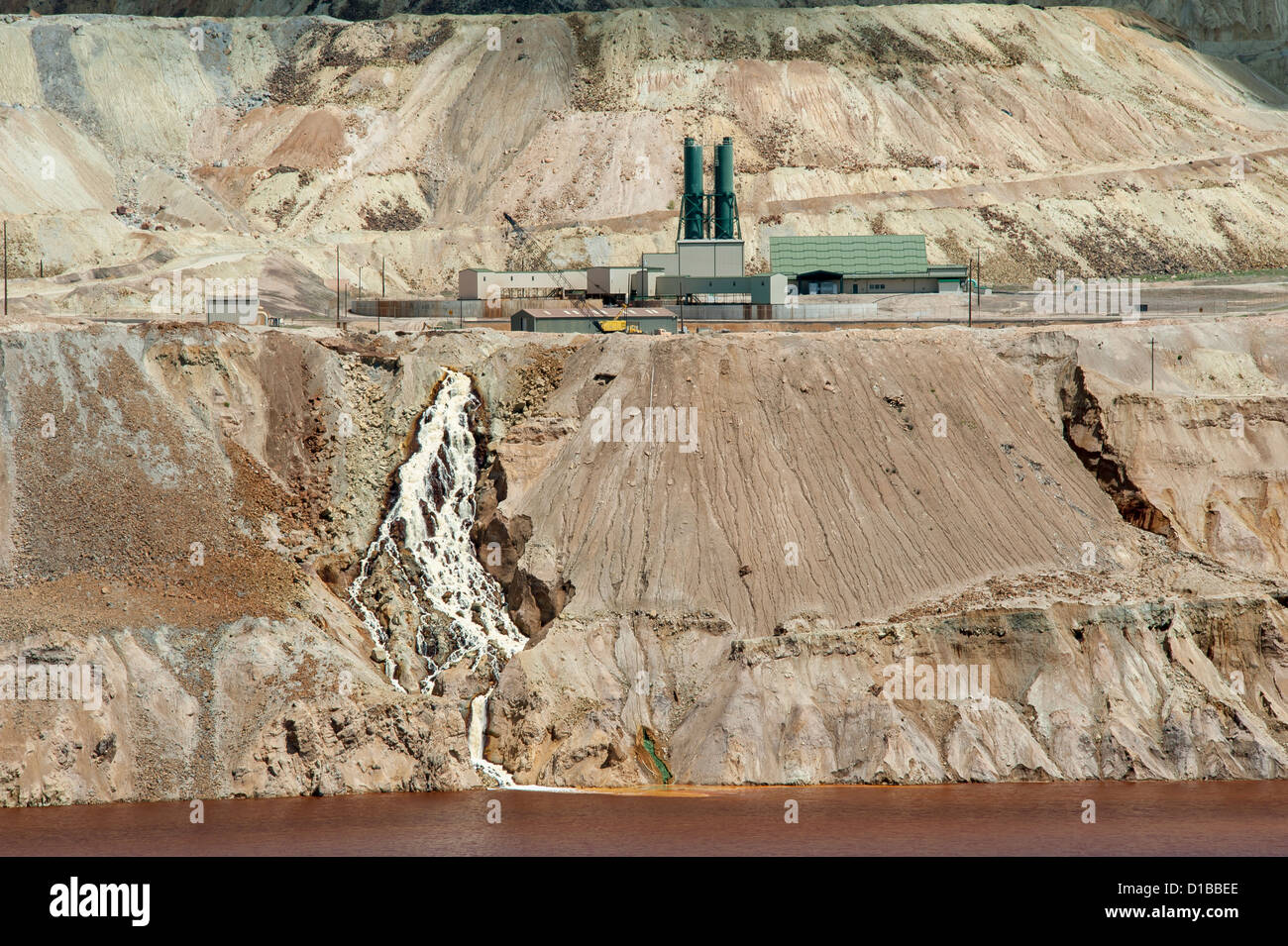 Water treatment plant along the edge of the Berkeley Pit in Butte, Montana.  The pit was an open pit copper mine. Stock Photo