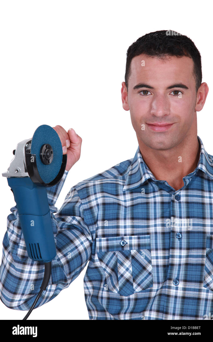 Man holding anglegrinder Stock Photo Alamy