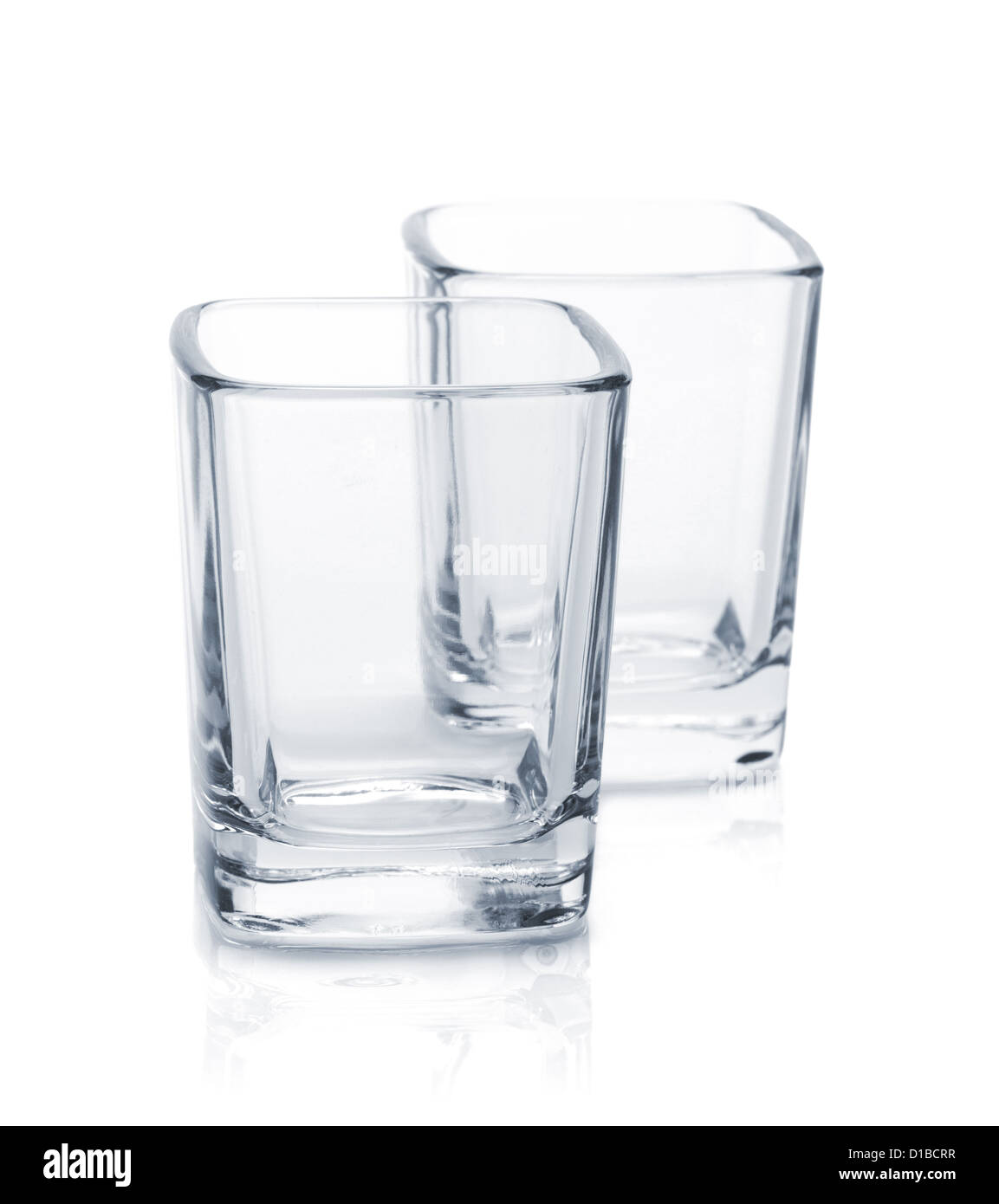 Shot glasses. Isolated on white background Stock Photo - Alamy