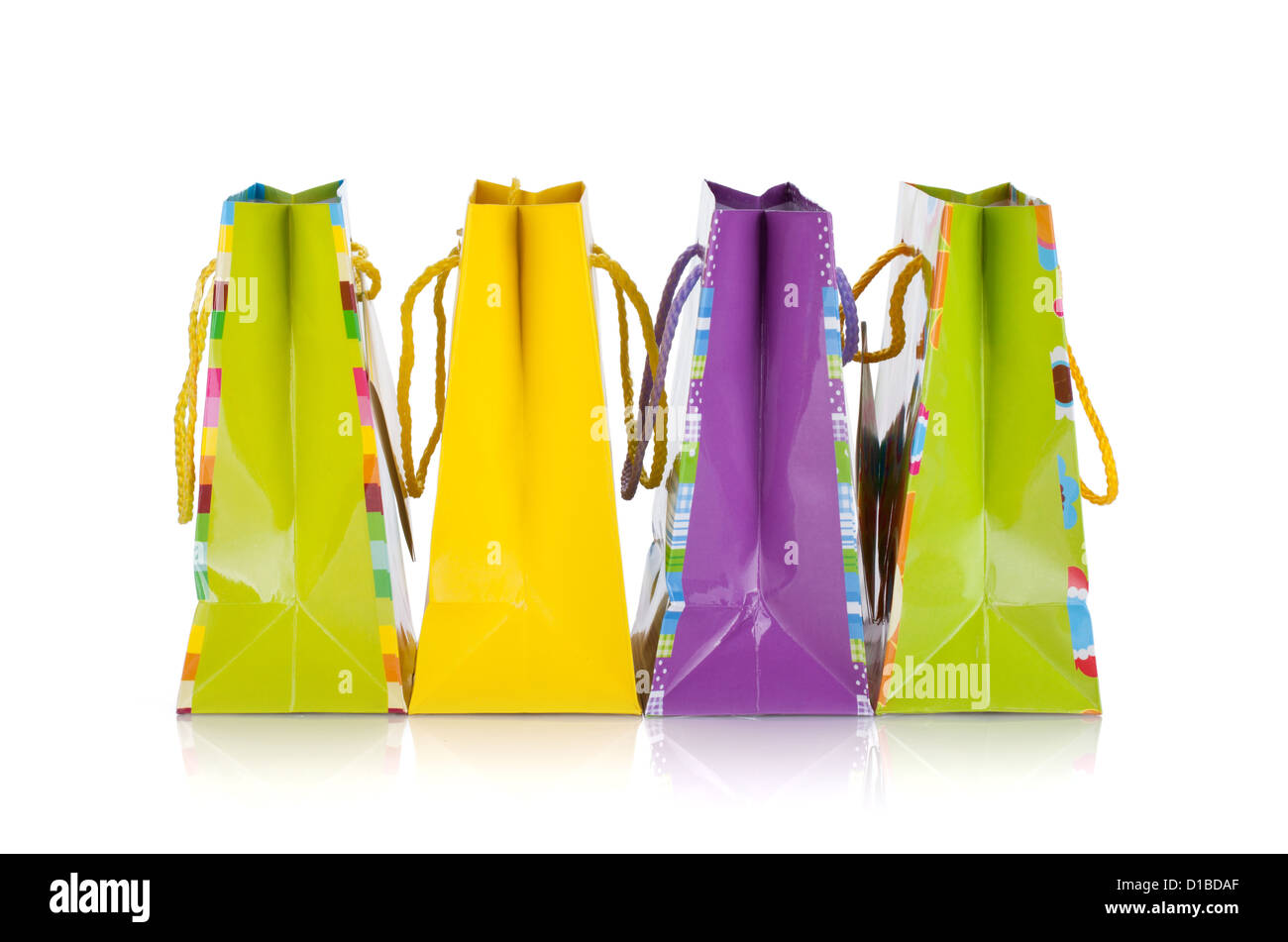 Color Presents Bag Stack Four colored gift bags. Isolated on white background Stock Photo - Alamy