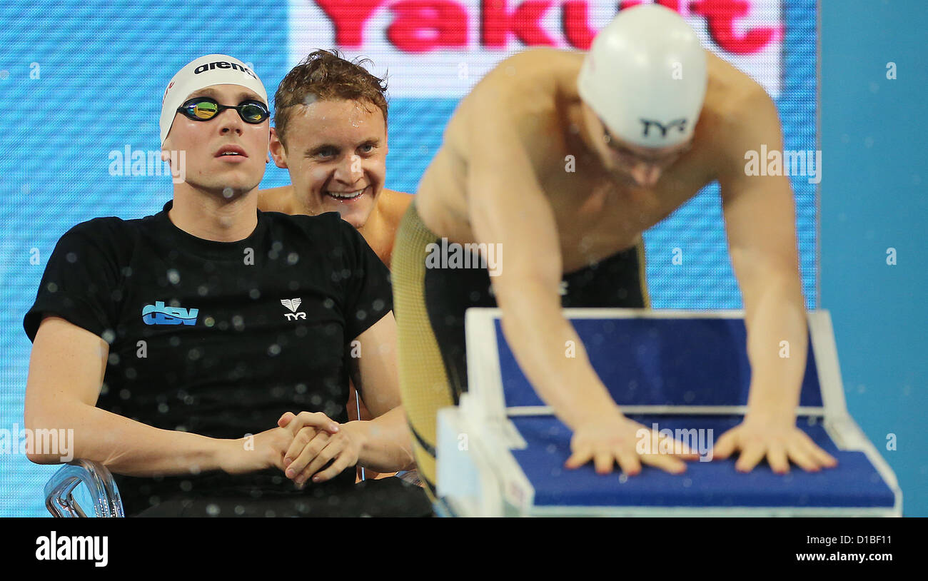 Paul Biedermann, Dimitri Colupaev, and Yannick Lebherz (l-r) of Germany comete in the the men's 4x200m freestyle heat during the World Short Course Swimming Championships in Istanbul, Turkey, 13 December 2012. Photo: Hannibal/dpa +++(c) dpa - Bildfunk+++ Stock Photo
