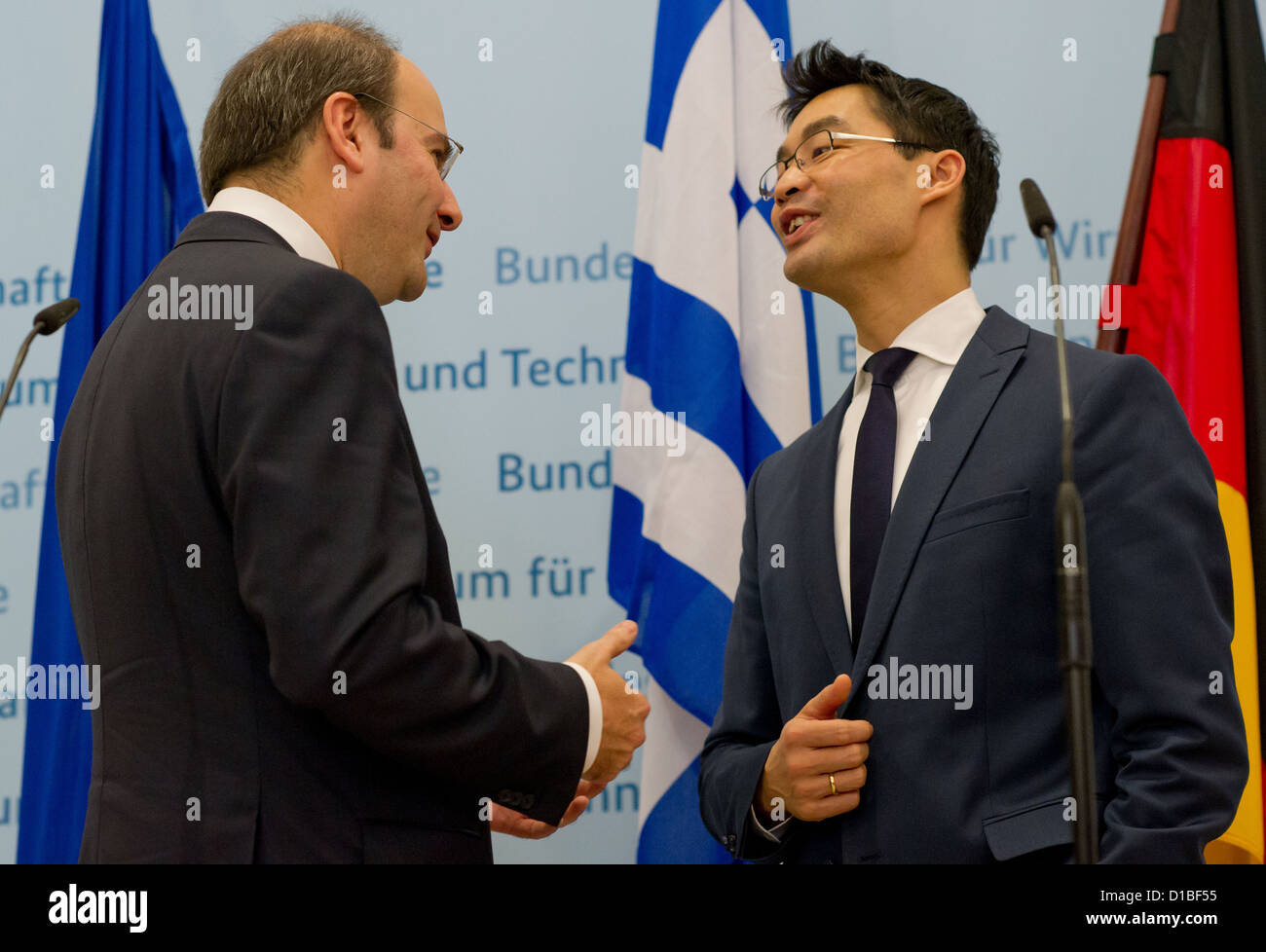 German Economy Minister Philipp Roesler and his Greek counterpart Konstantinos Chatzidakis (L) give a press conference in Berlin, Germany, 13 December 2012. Photo: TIM BRAKEMEIER Stock Photo