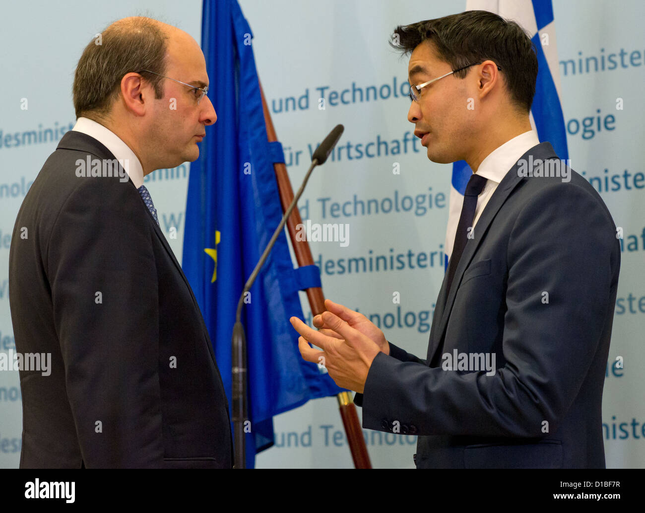 German Economy Minister Philipp Roesler and his Greek counterpart Konstantinos Chatzidakis (L) give a press conference in Berlin, Germany, 13 December 2012. Photo: TIM BRAKEMEIER Stock Photo