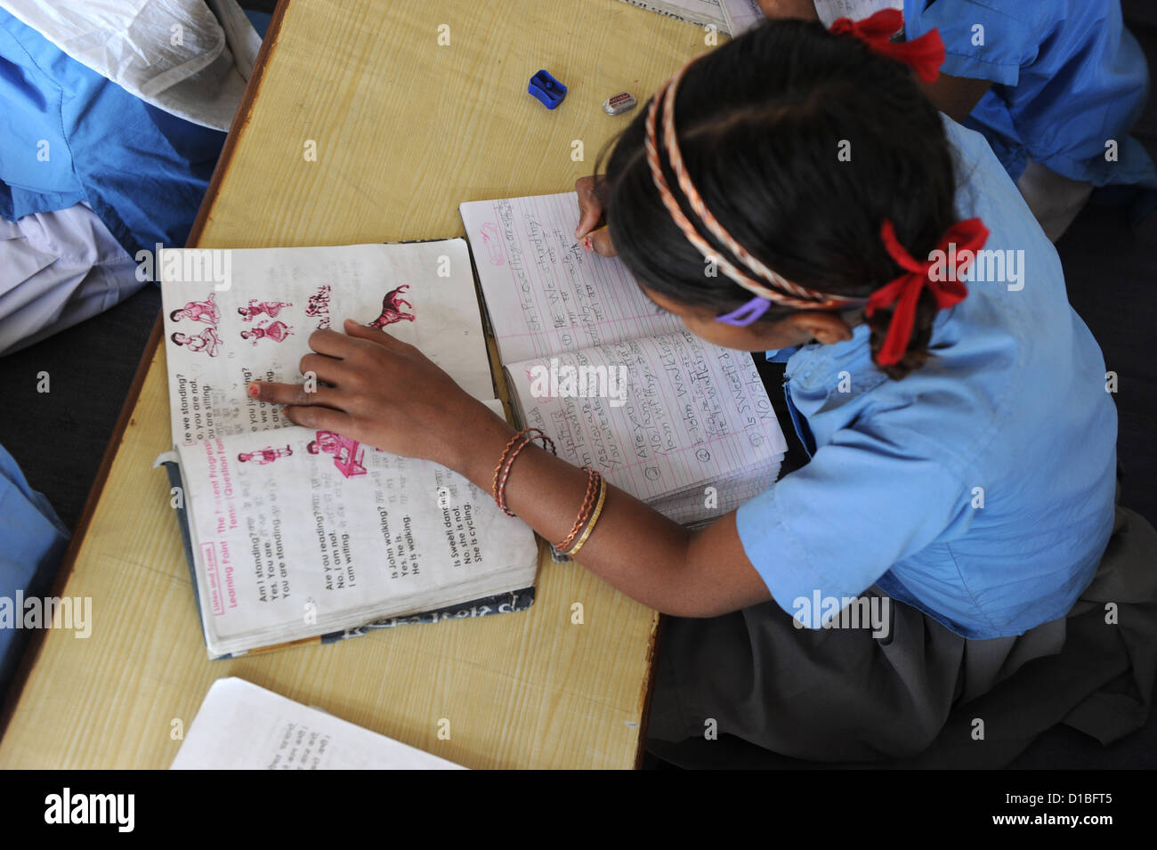 Indian school girls reading hi-res stock photography and images - Alamy