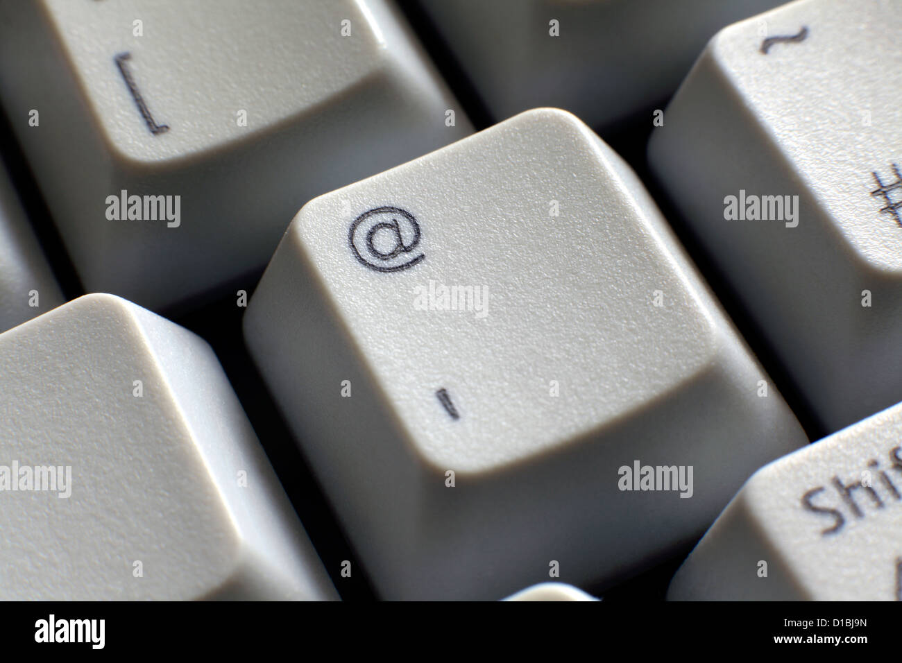 Close up of the @ key on a computer keyboard. Stock Photo