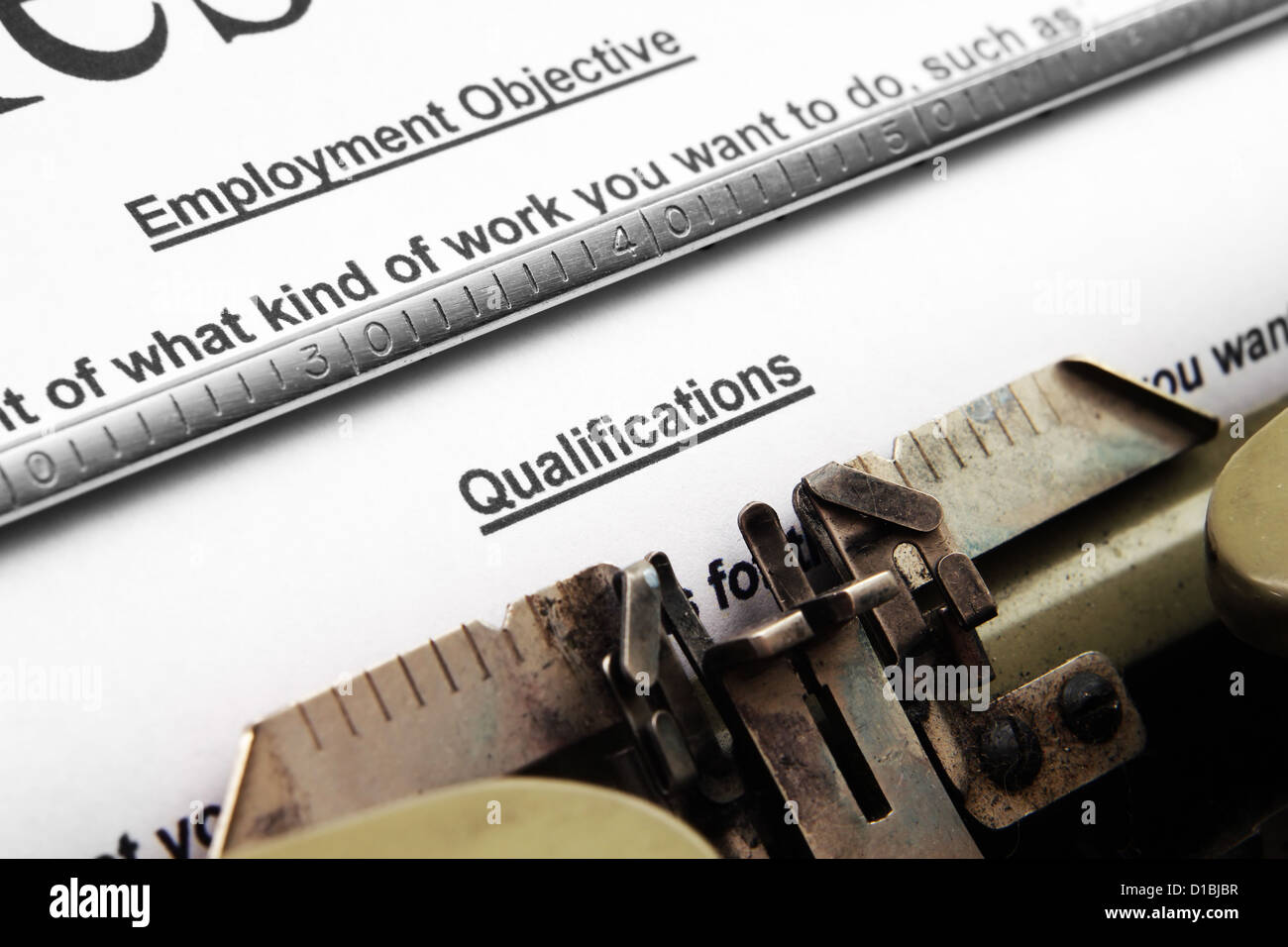 Qualifications text on typing machine Stock Photo