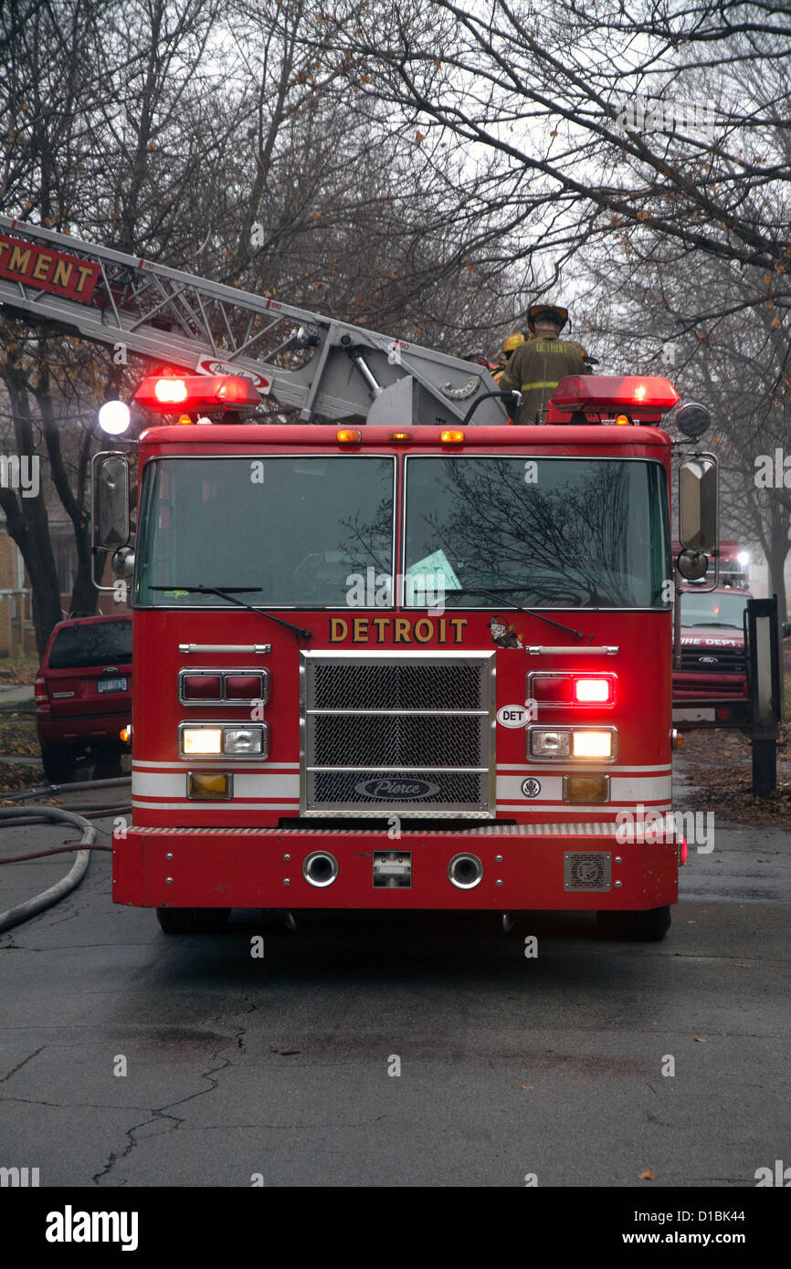 Ladder Company 22 at scene of house fire Detroit Fire Department Detroit Michigan USA Stock Photo