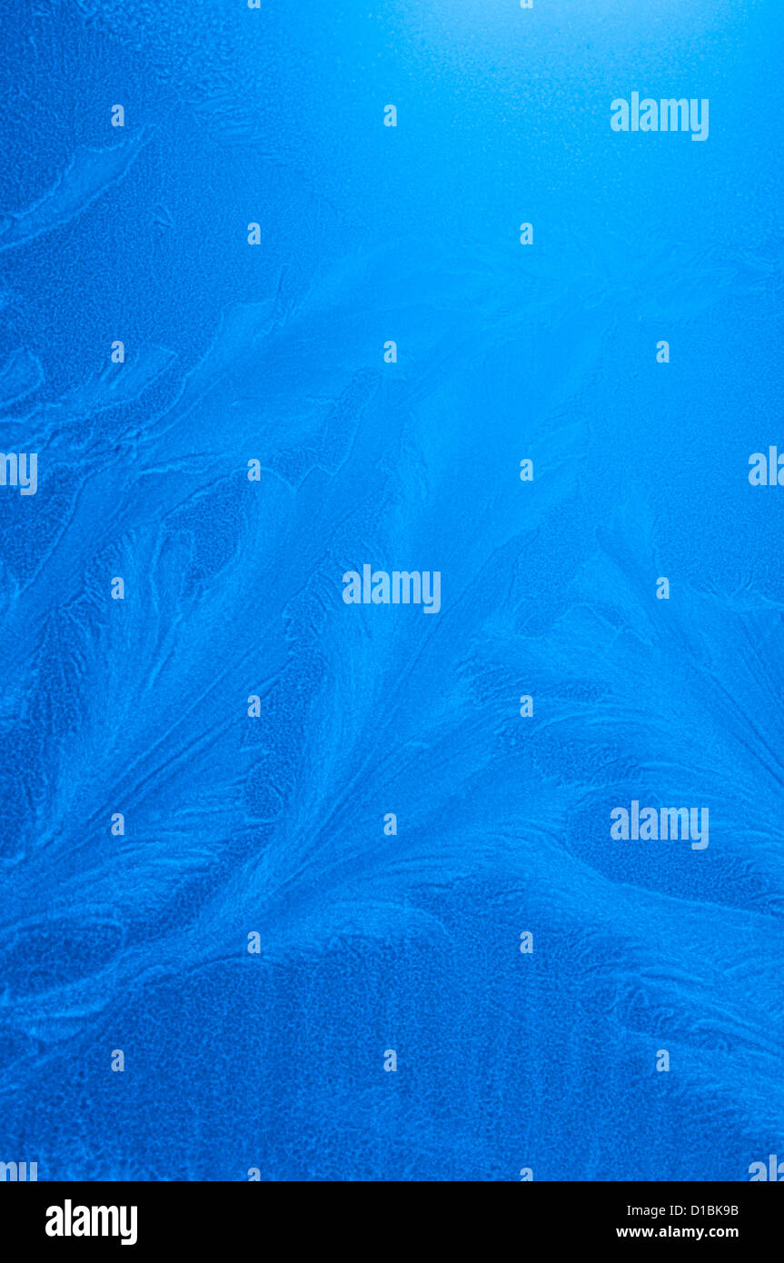 Frosty pattern on window in winter season Stock Photo - Alamy