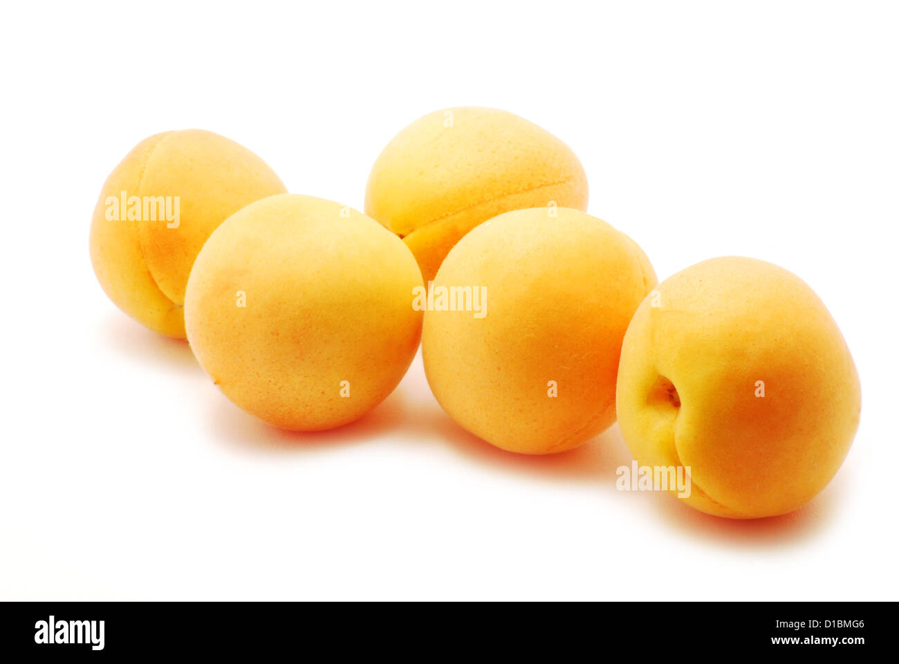 Apricots on white background Stock Photo Alamy