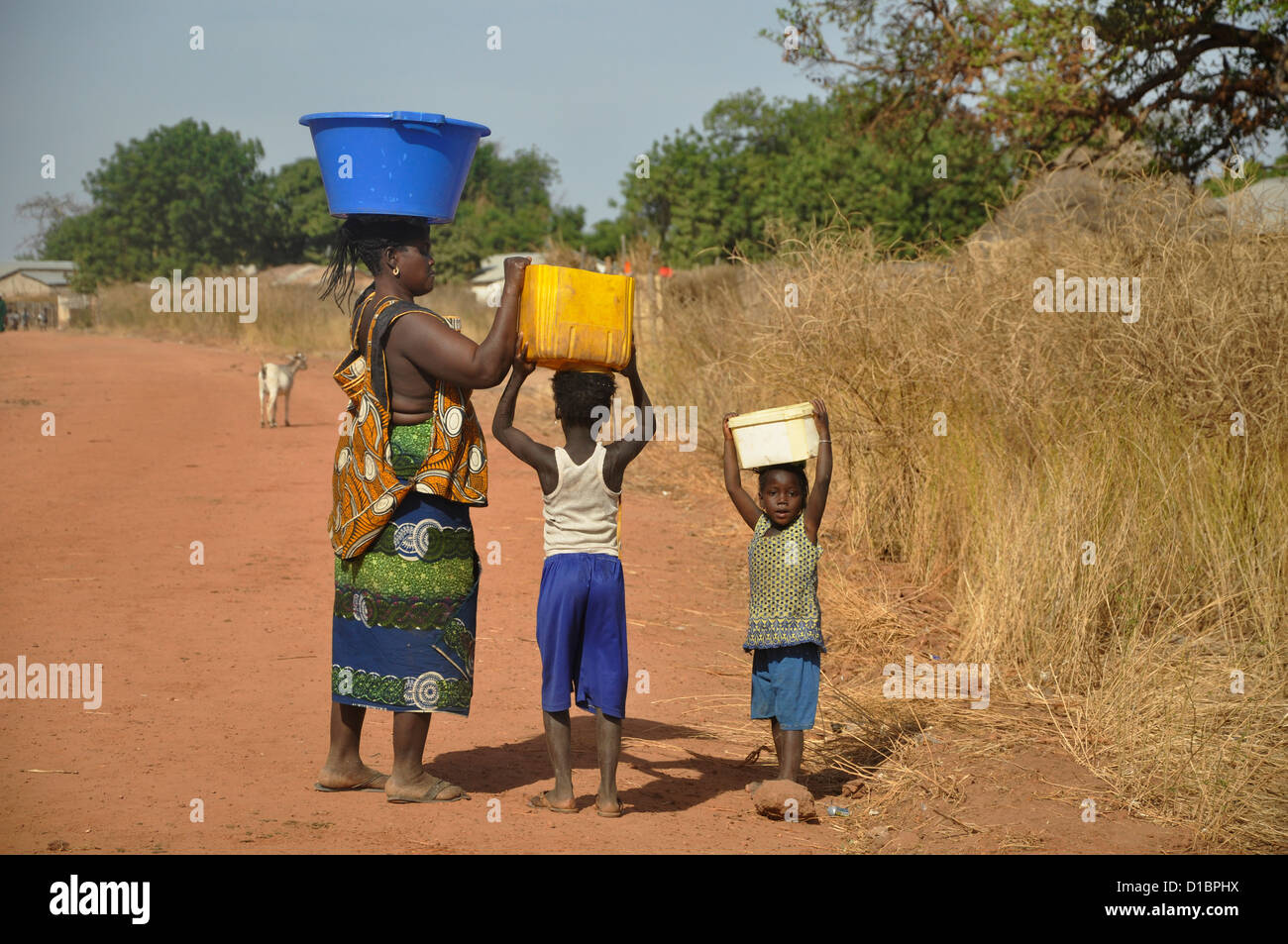 Carrying water containers hires stock photography and images Alamy