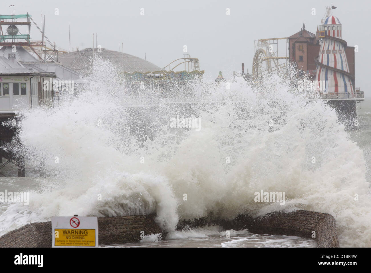 Sea Front Officers close parts of the beach as high winds and seas threaten flooding.in Brighton. Stock Photo