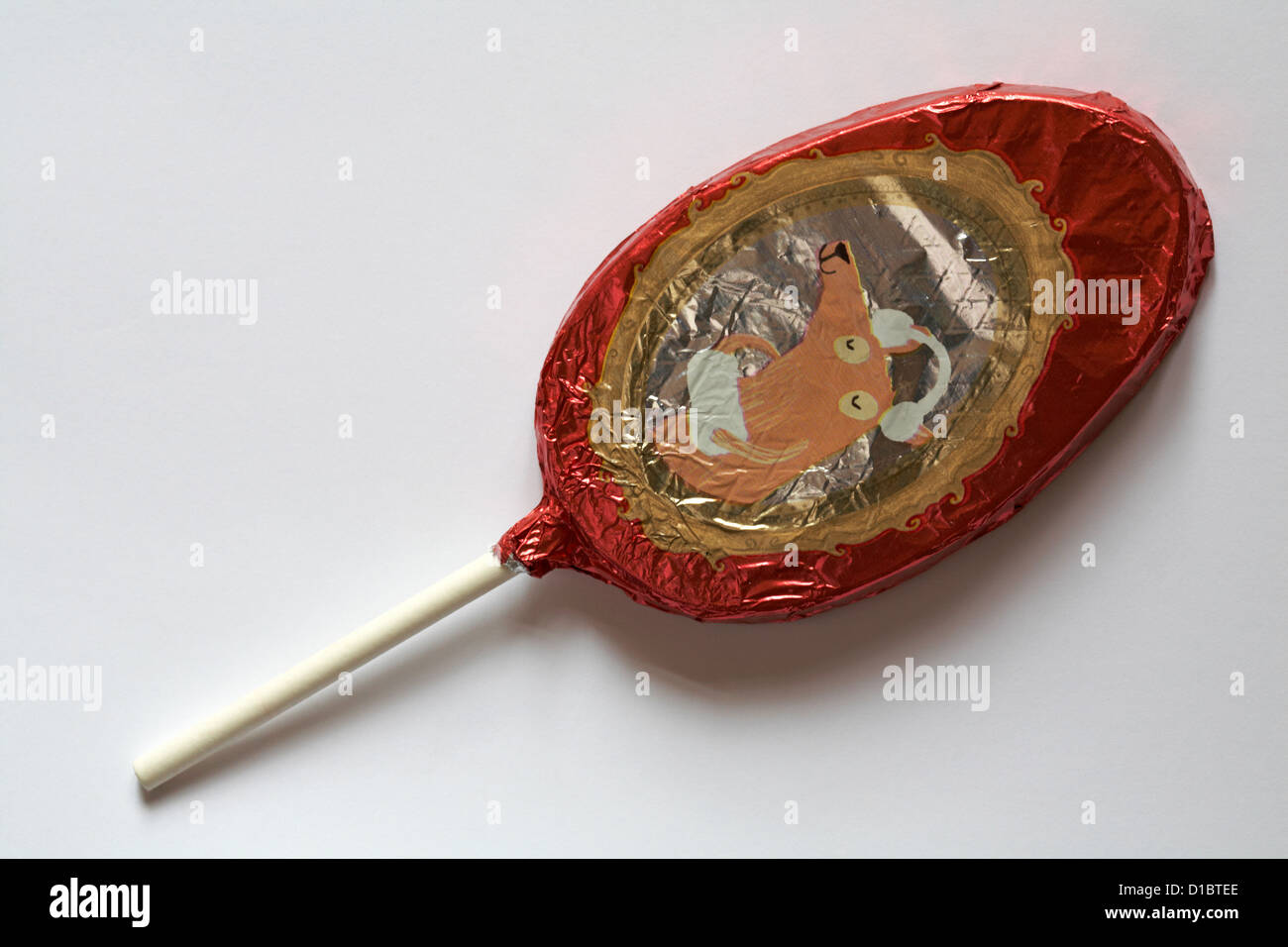 Christmas foil wrapped chocolate lolly ready for Christmas isolated on white background Stock Photo