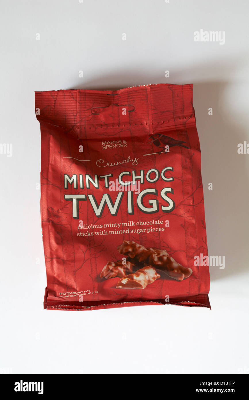 Bag of Marks & Spencer Crunchy Mint Choc Twigs isolated on white