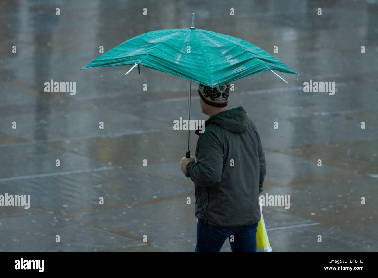 Broken umbrella in rain, people hi-res stock photography and images - Alamy