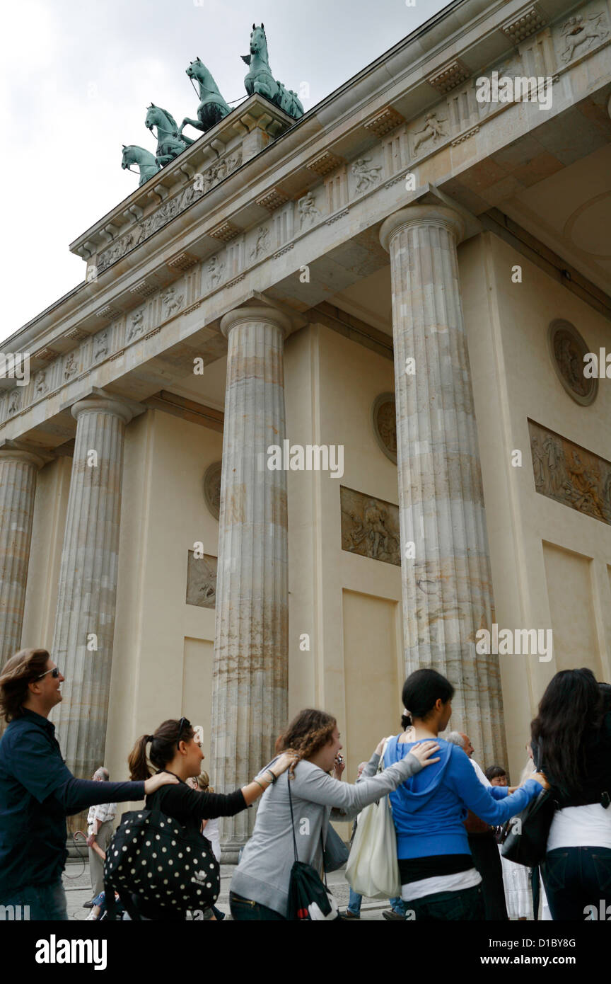 Berlin, Germany, tourists dancing omitted at the Brandenburg Gate Stock Photo